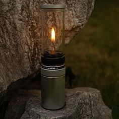 a light that is sitting on top of a rock