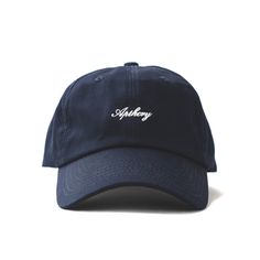 Elevate your style this summer with our Script Logo Hat! Navy dad hat features a contrasting white APTHCRY® embroidery on the front panel with an adjustable strap back. One size fits most. Adjustable Strap back Embroidery Logo Mid Profile Cap Product Photography, Cool Hat Designs, Minimalist Hat, Navy Ball, Cap Store, Racquet Club, Wife Style, Hat Aesthetic, Navy Hat