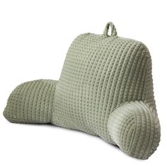 a green pillow with two pillows on the back and one is folded up to show it's side