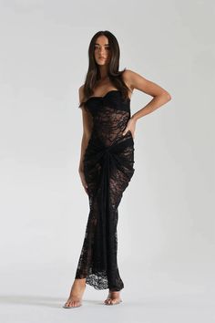 Step into a world of refined beauty with our exquisite lace strapless maxi dress, designed to highlight your natural elegance and sophistication. This strapless maxi dress showcases a stunning bardot neckline, beautifully enhanced with intricate ruched knot detailing for a touch of timeless grace. Crafted with precision, the dress features elegant lace that cascades from the hip to the waist, meticulously draped to enhance and sculpt your figure into a flattering hourglass shape. The strapless design elegantly exposes the shoulders and neckline, making it a perfect match for sophisticated evenings or romantic outings. This lace maxi dress is unlined, lending a delicate and airy quality that moves beautifully with you, embodying the essence of romantic allure. Ideal for upscale events or lu Calypso Dress, Maxi Design, Bardot Neckline, Strapless Lace Dress, Body Outfit, Blythe Dress, Lace Strapless, Hourglass Shape, Strapless Maxi