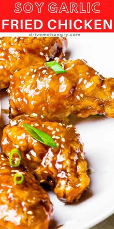 chicken wings with sesame seeds and green onions on a white plate text reads soy garlic korean fried chicken