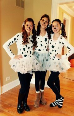 three girls dressed up in polka dot outfits