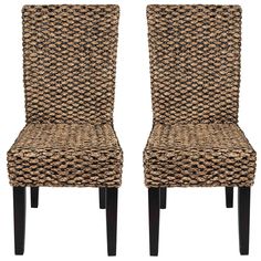 two brown chairs sitting next to each other