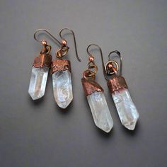 Raw Quartz Points Copper Earrings | Quartz Jewelry | Dangle Earrings | Boho Drop Earrings | Electroformed Copper | Stone Earrings.  These gorgeous drop earrings have a raw and rustic look, showcasing raw quartz crystal points with electroformed copper caps. They come with Niobium ear wires - perfect for anyone with metal sensitivities, as Niobium is naturally hypoallergenic. The antique copper finish adds a touch of old-world charm to these earrings. FEATURES: * beautiful boho-style drop earrings * feature raw quartz crystal points * electroformed copper caps * Niobium ear wires - niobium is naturally hypo-allergenic, making it especially suited for those with metal sensitivities * antique copper finish * handmade in Santa Fe, NM, USA Earrings are made to order and ready to ship in 3 - 5 b Sage Jewelry, Boho Drop Earrings, Raw Quartz Crystal, Dangle Earrings Boho, Raw Quartz, Electroformed Jewelry, Quartz Jewelry, Santa Fe Nm, Spiritual Wisdom