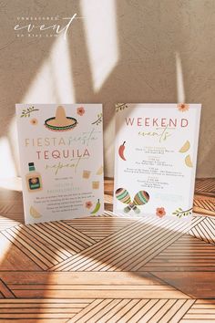 two mexican themed menus sitting on top of a wooden table