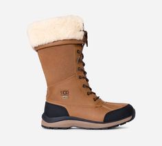 Your way to a classic winter wonderland just got unlocked with the Adirondack Boot Tall. It's one of our longest-running chilly season styles for a reason. Like its cousin, the Adirondack Boot -- our tall version provides even more winter tech warmth. The waterproof Adirondack has a flexible White Spider Rubber outsole to help you stay sturdy. With extra warming insulation, a cushioning insole, and a cold-weather rating of -32C, this boot was born in the cold to keep you warm. | Waterproof. Wate Ugg Hiking Boots, Adirondack Ugg, Adirondack Ugg Boots, White Spider, Cold Weather Boots, Weather Boots, Cold Weather Fashion, Tall Boot, Stylish Boots