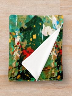 a napkin with an abstract painting on it