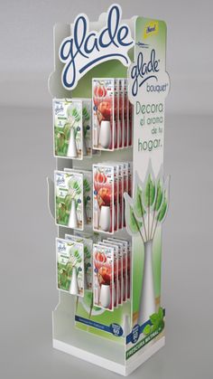 a display case for toothbrushes with the word glade on it's side