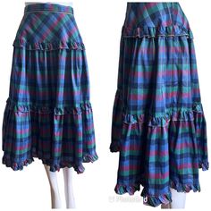 "Vintage skirt from the 1970s or early 80s Check print in shades of blue, green and mauve with gold piping and gold thread going through it Tiered skirt with frills on three tiers Fully lined Made by Betty Barclay from a synthetic taffeta type fabric In excellent vintage condition  Marked size 38, best fits a modern UK 8-20 approximately  Measurements: Waist 27\"/68.5cm Hips free Length 30.5\"/77.5cm More skirts: https://www.etsy.com/ie/shop/PaulaLovesVintage?ref=seller-platform-mcnav&section_id Skirt With Frills, Frilled Skirt, Going Through It, Frill Skirt, Evening Skirts, Check Skirt, Concert Outfits, Vintage Rock, Gold Thread