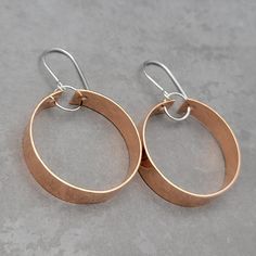 Make a statement in the super shiny copper hoop earrings. The copper resemble Rose Gold as a fraction of the cost. * Made to order and ships within 2 business days * Earrings hang approximately 1.75" from the top of the ear wire * Ear wires are handmade of .925 sterling silver * Polished to a high shine These are thoughtfully handmade in my mountain studio at time of order, making each one unique. Nothing in my shop is mass produced. Every item is carefully created, packaged and shipped with tra Earring Packaging, Leather Goodies, Student Collaboration, Garlic Butter Shrimp, Butter Shrimp, Earring Cards, Big Earrings, Copper Earrings, Garlic Butter