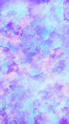 the sky is filled with purple and blue stars, as if it were in outer space