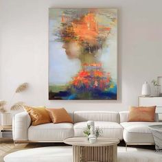 a living room filled with furniture and a large painting on the wall above it's head