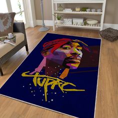 a living room area rug with a painting of a man's face on it