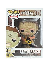 the pop vinyl figure is shown in its box, and it has a character holding a knife