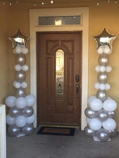 balloons and stars are on the front door