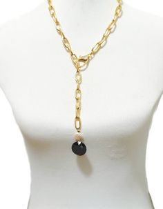 Large Chain Link Necklace with Cubic Zirconia Briolette Grab one of these eye-catching chain link Necklace! Made with premium 18k gold plated metal chain. The clasp is micropave. The drop is a 22cm natural round cubic zirconia briolette with a a natural disk shaped freshwater pearl! Come is Three different colors! Red Garnet, Micro Pave, Chain Link Necklace, Link Necklace, Metal Chain, A A, Chain Link, Freshwater Pearls, Garnet