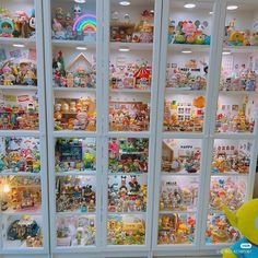 a display case filled with lots of toys