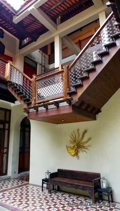 the stairs are made of wood and metal