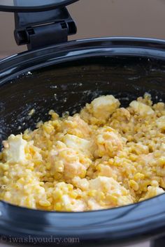 the food is being cooked in the slow cooker