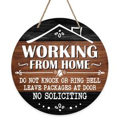 a sign that says working from home do not knock or ring bell leave packages at door no soliciting