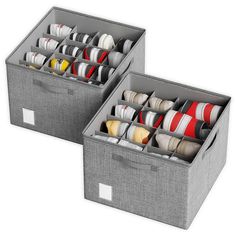 two storage bins with ties in them