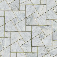 a white marble tile with gold trim