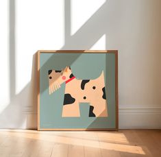 the shadow of a cow is cast on an empty room wall with a wooden frame