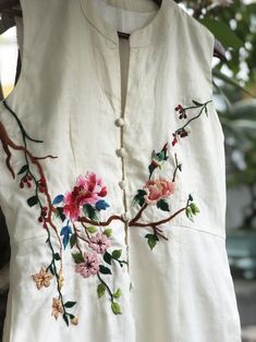 ❤ The beige linen hand embroidered dress is very soft, skin friendly, breezy and comfortable.  ❤ Item description: - A lovely dress with embroidered bird and flowers motifs. - Material: linen, buttons, embroidery threads. - Environmentally friendly. - This dress is very useful, go with any outfit, that can be used to go to school, go out, go shopping.    It is a perfect gift for yourself or your beloved.  ❤ Care instructions:       The best way to wash embroidery cloth is to put it in soapy water (with a mild detergent and cold water at 86 ºF/30oС) for 20 minutes. Try to not wash the item with other clothing that might cause damage, such as zippers, buttons or different colors. You wash it by hand, and if you have dirty patches on your garment, you can gently rub them, it's best not to rub Affordable Embroidered Casual Dresses, Casual Floral Embroidery Dress, Cheap Embroidered Women's Dresses, Cheap Embroidered Hem Dress For Summer, Casual Cotton Embroidered Dress, Cheap Cotton Dresses With Floral Applique, Cheap Embroidered Dresses For Women, Cheap Cute Embroidered Dresses, Cheap Casual Embroidered Dress For Women