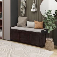 a living room with a bench, mirror and potted plant on the wall next to it