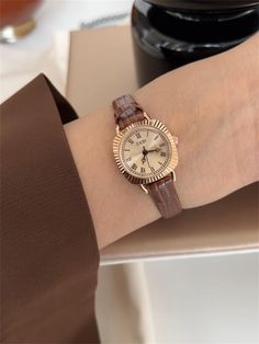 ✅ Materials: -stainless steel - glass - genuin leather ✅ Dimensions: - Case length : 23mm -Case width: 23 mm - Case height: 9mm - Band width: 9mm - Band Length: 21cm 📦 Delivery: We offer worldwide shipping with tracking included. To ensure timely delivery, please provide an accurate shipping address and a contact number for updates. 🛡️ Care Instructions: * Avoid wearing the watch while bathing or exposing it to high temperatures. * To prevent tarnishing, steer clear of substances like oils, pe Womens Gold Watch, Dainty Gold Watch, Dainty Watch, Watch Womens, Brown Leather Watch, Gold Watches Women, Watch Vintage, Vintage Women, Vintage Watches