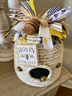 a honey jar with some bees on it