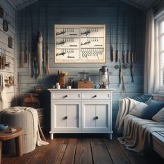 a room with wooden floors and blue walls, including a white cabinet in the center