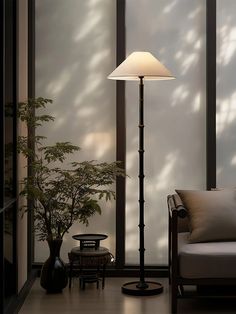 a living room scene with focus on the floor lamp