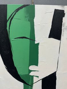 an abstract painting with black, white and green colors