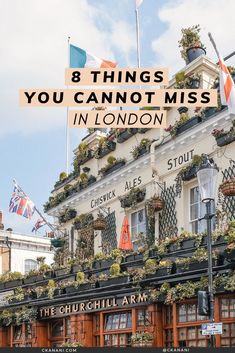 the outside of a building with flags flying in the background and text that reads 8 things you cannot miss in london