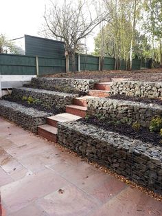 stone steps leading up to the top of a hill