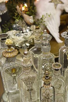 an assortment of decorative glass bottles on display