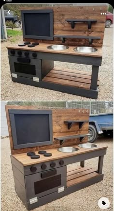 an outdoor kitchen made out of pallets and wood with two televisions on top