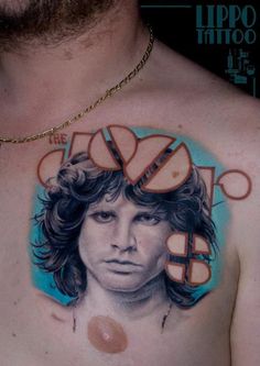 a man's chest with an image of the doors on it and circles around him