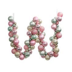 the letter m is made out of pink, green and white beads with silver balls