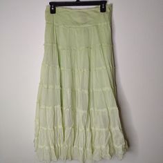 Add A Touch Of Elegance To Your Wardrobe With This Stunning Chaudry Women’s Skirt In A Beautiful Pastel Green. Brand New With Tags (Nwt), This Skirt Is Perfect For Any Occasion. The Tiered Ruffle Design Adds A Playful And Feminine Flair, Making It Ideal For Spring And Summer Outings. *Sample Piece* Green Flowy Bottoms, Green Flowy Skirted Bottoms, Green Skirts, Ruffle Design, Pastel Green, Green Skirt, Women Skirts Midi, Long Skirt, Light Green