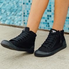 Want to dial down the color? Check out our pure black Jazzin Hi - our most undercover kicks this season. Pair with something just as muted for a stealthy, cooler-than-cool look. Rocket Dog women's high top sneaker All black canvas upper Oversized rubber toe cap Tonal Rocket Dog embossed heel counter logo Rubber sole Soft cotton lining Lace-up high top sneaker Side zipper fastening Plush Foam comfort insole All Black High Tops, Black High Top Sneakers, Rocket Dog, Pure Black, High Top Sneaker, Black High Tops, Black Canvas, High Top, Rocket