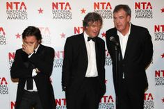 three men in tuxedos standing next to each other at a national television awards