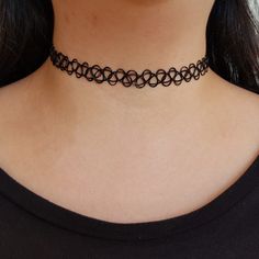 🖊️ Product details 🖊️ Trendy black tattoo choker. The tattoo choker can be stretched to fit any size.  Two-piece tattoo set: 1 x Bracelet  1 x Choker Three-piece tattoo set: 1 x Black Choker Necklace  1 x Bracelet  1 x Ring Colours available: 1. Clear 2. Y2K Pink 3. Doja Pink 4. Baby Blue  5. Cerulean 6. Teal 7. Ruby Red 8. Lime Green 9. Amethyst 10. Rose 11. Tangerine 12. Neon lemon 13. Cinnamon 14. Rainbow Road 15. Banana 16. Leaf Green Karen's neck is 35cm. Mojo models sample necklaces only, he is not involved in the handling of your jewellery for hygiene purposes! 🐾 Check out our charm tattoo chokers! https://www.etsy.com/au/listing/1076947865/black-tattoo-choker-necklace-with-charm?ref=shop_home_active_25   💛 Thank you for choosing our store, we hope you love your goodies as much Wire Tattoo, 90s Tattoos, Charm Tattoo, Tattoo Choker Necklace, 90s Choker, Piece Tattoo, Necklace Tattoo, Tattoo Choker, Dr Closet