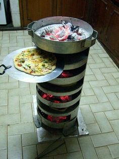 a pizza sitting on top of a metal pan