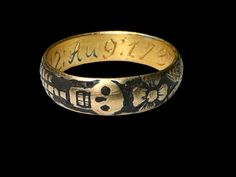 A Memento Mory gold and black enamel ring is also called a skeleton ring.Memento mori is a Latin phrase meaning 'remember you must die'. Finished in black enamel (niello) on the background, the skeleton is depicted around the whole surface of the ring and Fowler is behind the skull. An inscription on the inner band read: G. G.M.12:AUG:1737:AET 66: Circa 17th. Century Ad. Measurements: 18.2 mm., 5.19 grams. CONDITION Very good, with some light wear to the gold commensurate with age and use. Overa Collectible Symbolic Black Skull Ring, Symbolic Black Engraved Ring For Anniversary, Memento Mori Jewelry, Memento Mori Ring, Skeleton Ring, Phrase Meaning, The Skeleton, Signet Rings, Future Outfit