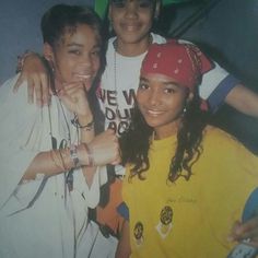 three young people posing for a photo together