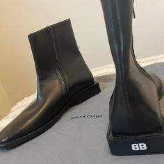 Balenciaga Bb Rim Square Heel Boots 616349. Like Brand New. Only Worn Once. Comes With A Dustbag, But No Box. Size Is 37.5 (Men) European Size / 7 (Men) Us Size Designer Square Toe Office Boots, Designer Fitted Square Toe Boots, Designer Almond Toe Business Boots, Designer Ankle Boots For Business, Designer Fitted Boots For Business, Designer Boots For Formal Occasions, Designer Formal Boots, Square Heel Boots, Balenciaga Heels