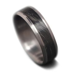 Crafted from solid Tantalum, this ring offers exceptional durability and a sleek, modern look. The forged carbon fiber inlay, adds texture and resilience, making it as strong as it is striking. Designed for both daily wear and life’s special occasions, The Creator is a statement of bold elegance that lasts a lifetime. Forged Carbon Fiber, Carbon Fiber, Daily Wear, Special Occasion, Ring Size, Sleek, The Creator, Texture, Ring