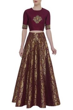 Bring home this embroidered crop top with brocade work skirt and give your clothing collection a fine upgrade.
Embroidered and brocade work
Round neckline and short sleeves
Comes with skirt
Long and flared silhouette - Aza Fashions Brocade Skirts And Tops, Skirt And Crop Top Indian, Designer Lehanga, Formal Skirts, Golden Lehenga, Long Skirt And Top, Traditional Skirts, Indian Wedding Lehenga, Brocade Skirt